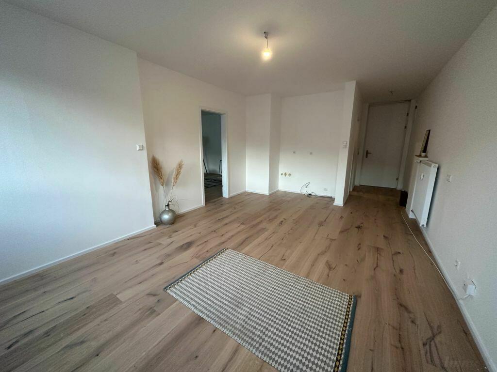Wohnung zu kaufen: 8010 Graz - Wohnzimmer mit Küchenanschlüssen